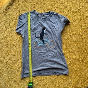 I mean, it’s a cat riding a bicycle shirt